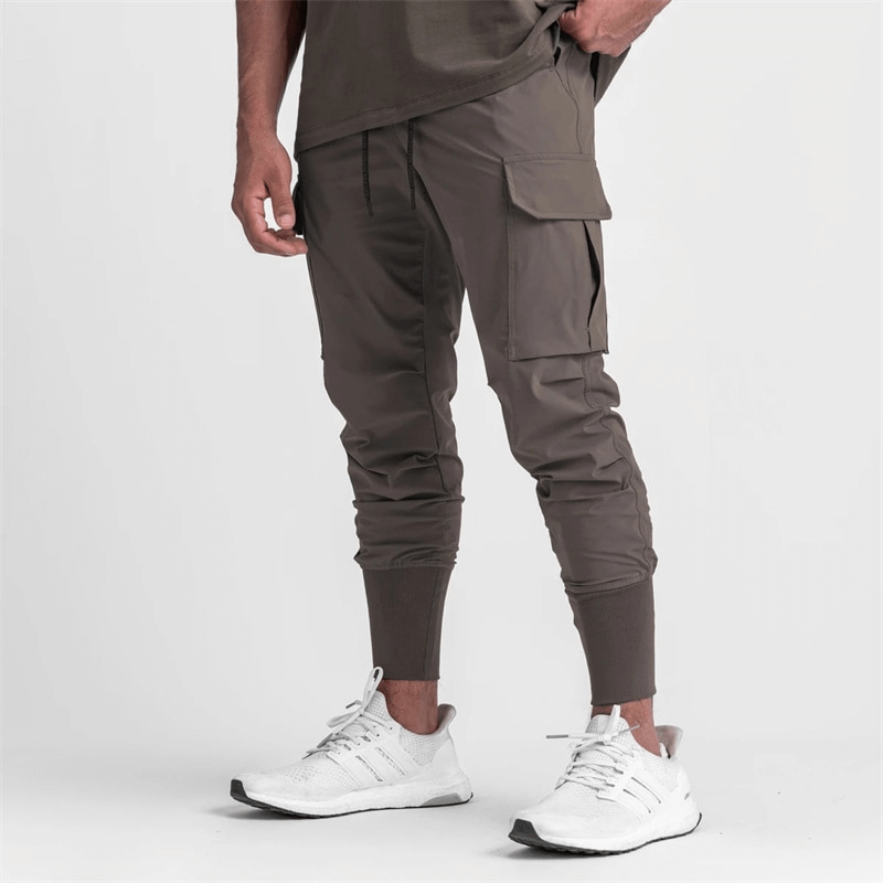 Men's loose slim joggers with wide cuffs, elastic waistband, and drawstring closure, perfect for workouts and running, SF1141