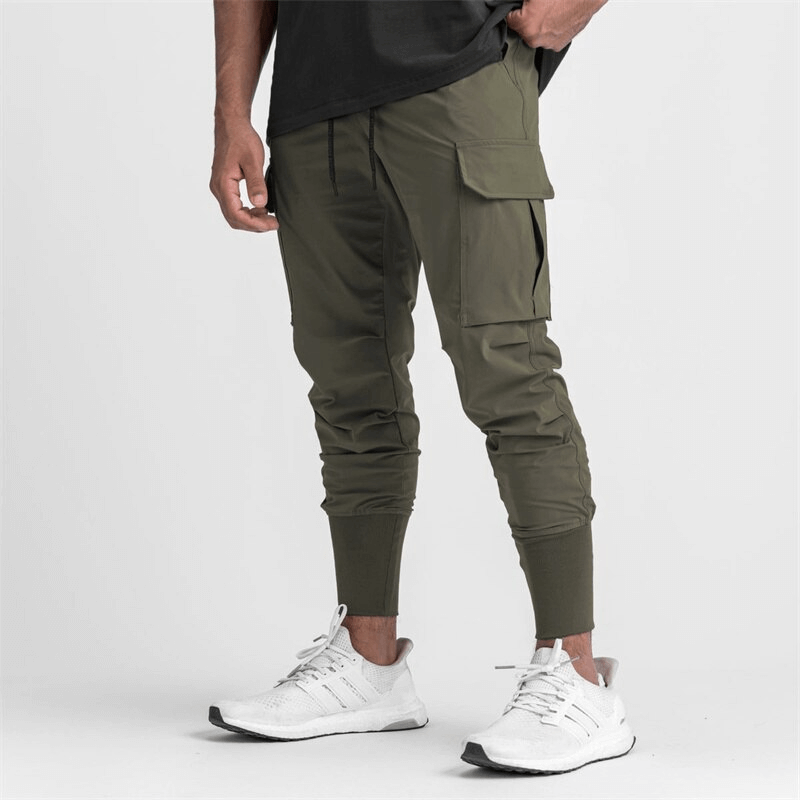Men's loose slim elastic joggers with wide cuffs, perfect for running and exercise, featuring a comfortable fit and drawstring closure.