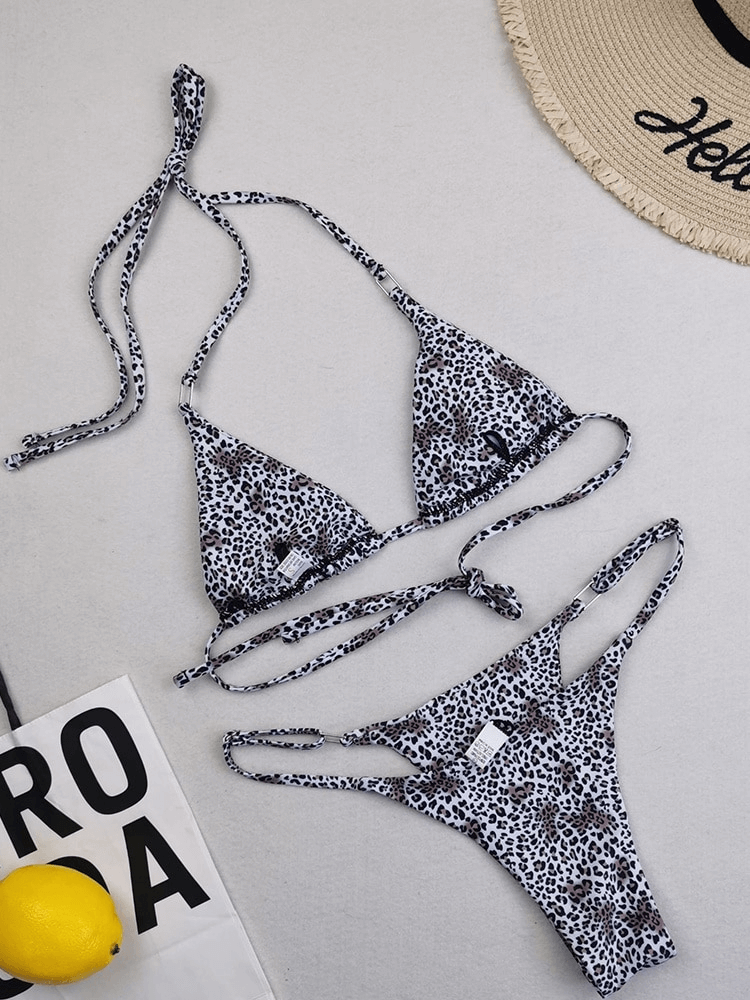 Leopard print Brazilian bikini set with low waist for women, featuring built-in pads and ultra-stretchy fabric, perfect for beachwear.