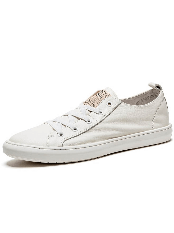 Luxury genuine leather white casual breathable men's shoes, crafted from premium cow leather with slip-on closure and robust rubber outsole.