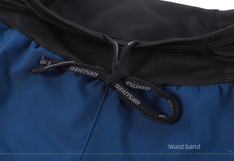 Close-up of the elastic waistband on blue male training shorts, featuring secure drawstrings for a snug fit.