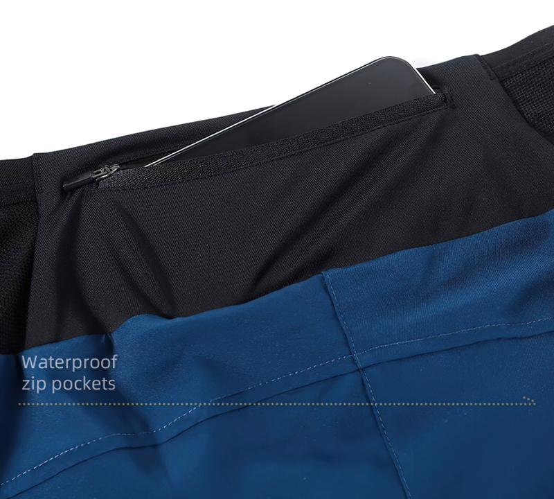 Close-up of male training shorts with waterproof zip pocket and phone for secure storage during running.