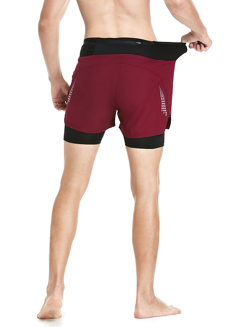 Back view of male wearing maroon double-layer high waist running shorts, showing elastic waistband and supportive fit.