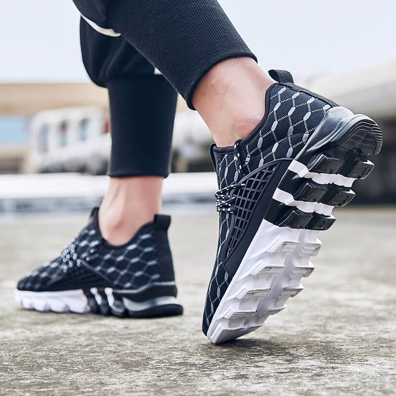 Man wearing male mesh running shoes SF0762 with breathable fabric and gingham pattern, ideal for casual walking and flexible support.