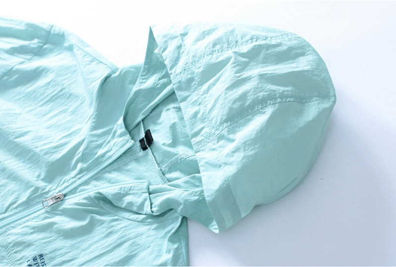 Mint green slim-fit sports windbreaker jacket with hood and zipper, perfect for outdoor active wear, model SF0942.