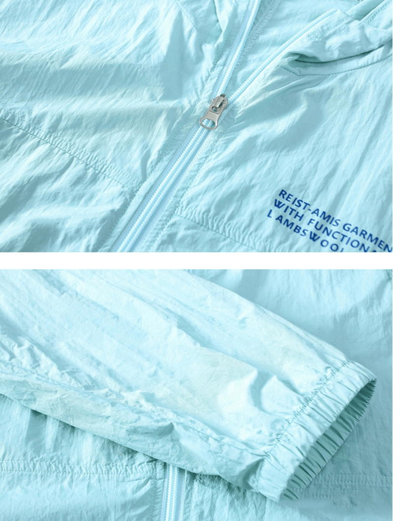 Light blue slim-fit windbreaker jacket with hood and zipper detailing.