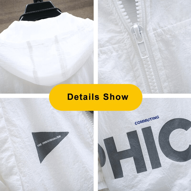 Close-up of a lightweight white windbreaker jacket with zipper, hood, and graphic details for sportswear.