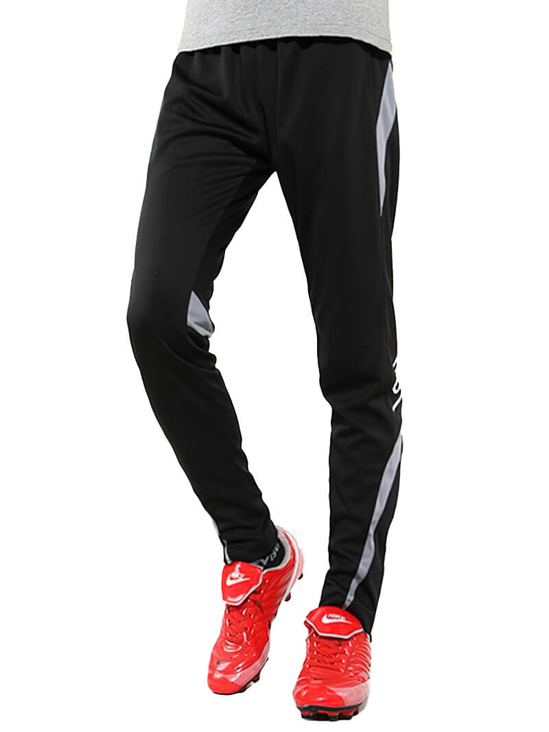 Male sports elastic waist trousers for workout, black with gray stripe, worn with red shoes. Ideal for running and sports. SF0446