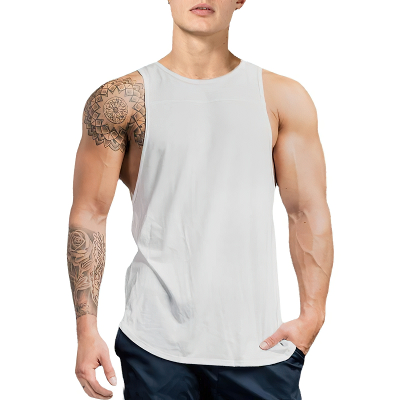 Man wearing a white cotton workout tank top with a slim fit, perfect for gym and sports activities like running, basketball, and weight lifting.