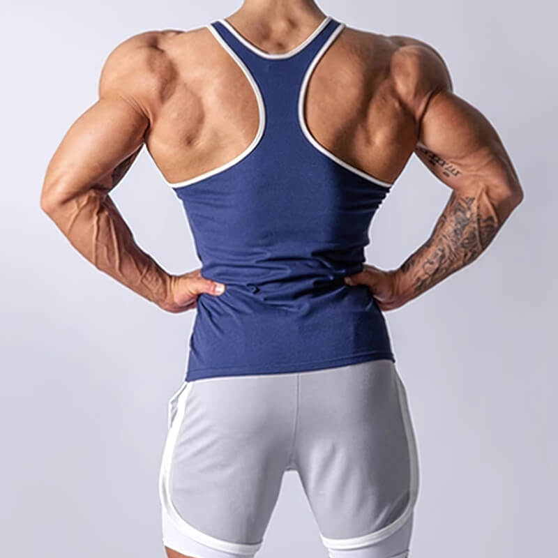 Male model showing back in blue cotton workout tank top, highlighting muscle definition and comfort for sports.