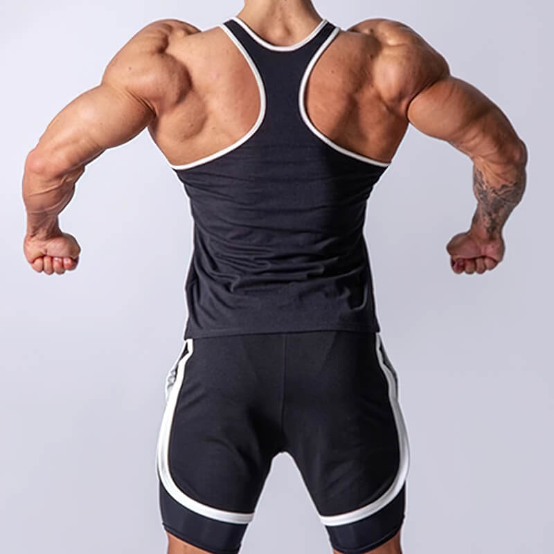 Back view of a male model wearing a black cotton workout tank top, designed for bodybuilders with breathable fabric and maximum comfort.