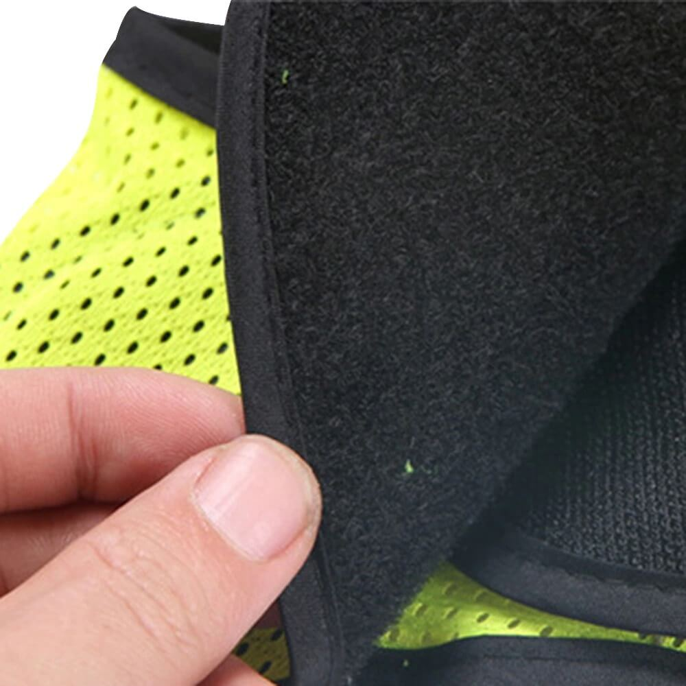 Close-up of high visibility reflective vest in neon yellow with black lining, perfect for night safety.
