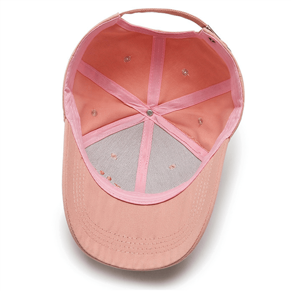 Pink unisex baseball cap with adjustable strap and smile print, offering UPF 50+ sun protection. Ideal for casual summer wear.
