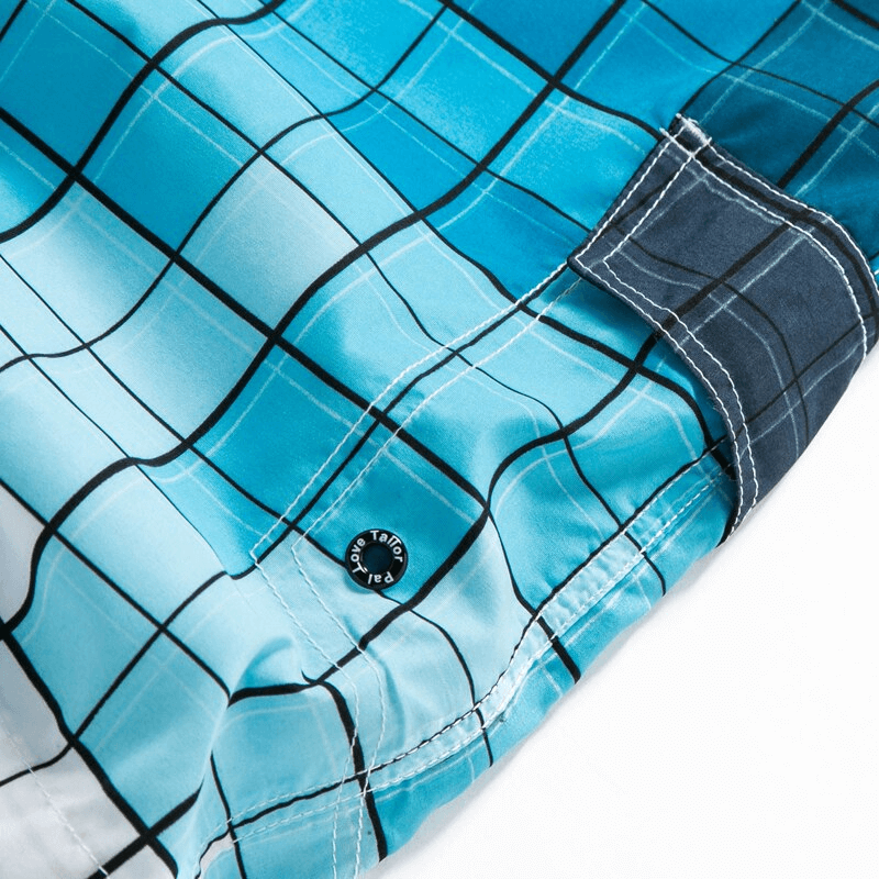 Blue plaid men's quick dry swimming shorts with a buttoned side pocket, perfect for beach activities and comfort.