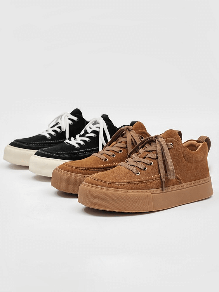 Men's breathable leather casual sneakers in brown and black options with flexible rubber outsoles, perfect for stylish comfort.
