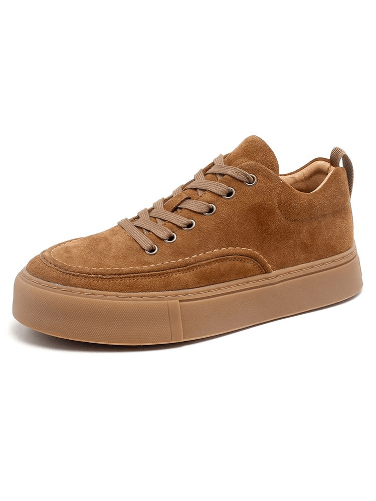 Men's brown leather casual sneaker with breathable design and flexible rubber outsole, offering stylish comfort for everyday wear.