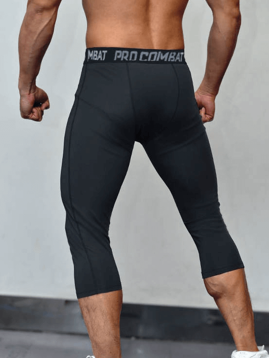 Men's breathable compression capri pants for gym in black, showcasing lightweight and supportive fit, designed for athletic activities.