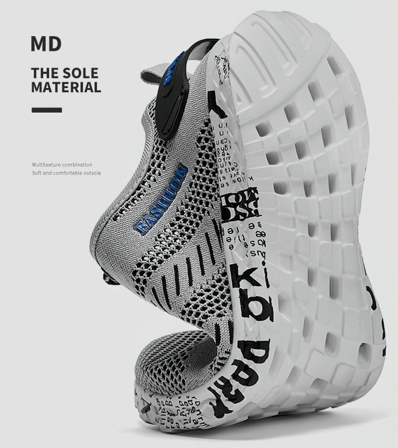 Close-up of Men's Casual Lace-up Mesh Sneakers focusing on flexible soft outsole and geometric pattern with MD sole material text.