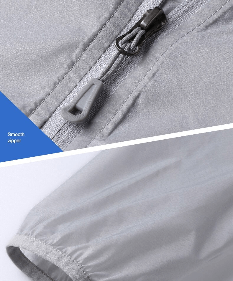 Close-up of grey windbreaker's smooth zipper and cuff detail, highlighting lightweight quick-drying fabric for men.
