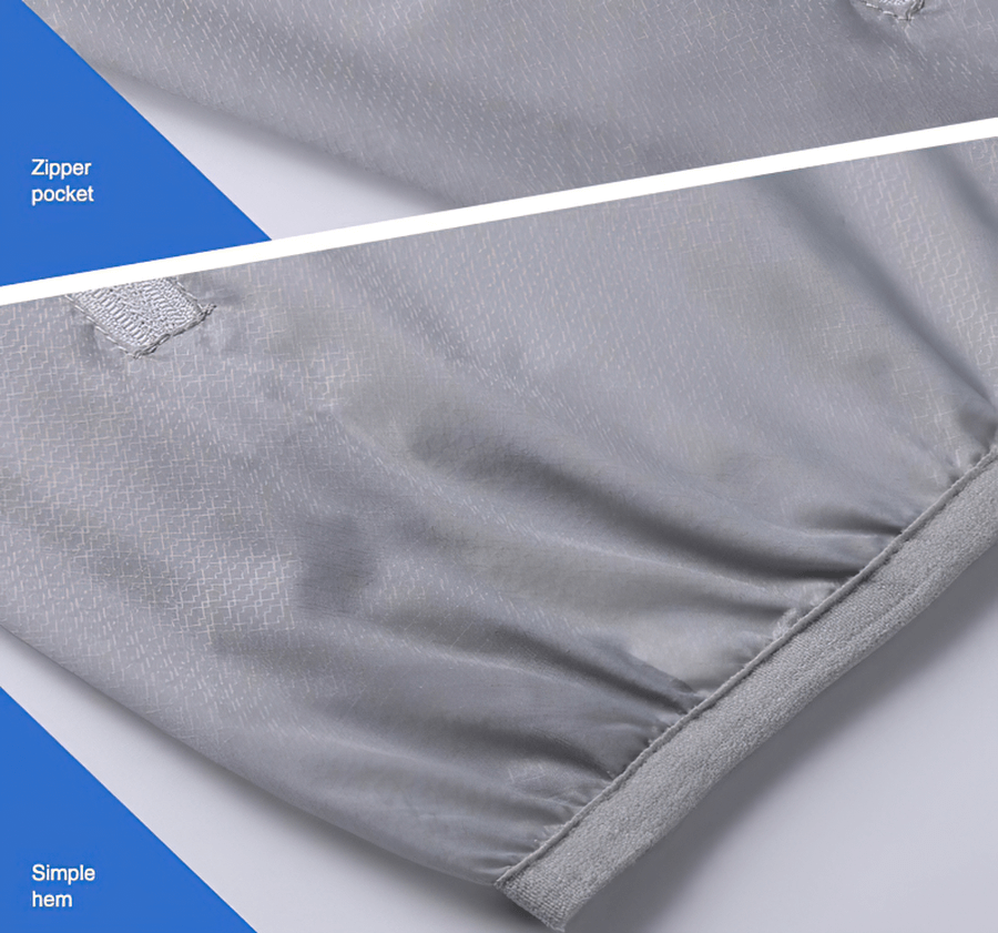 Close-up of men's windbreaker showing smooth zipper pocket and simple hem in a striped pattern.