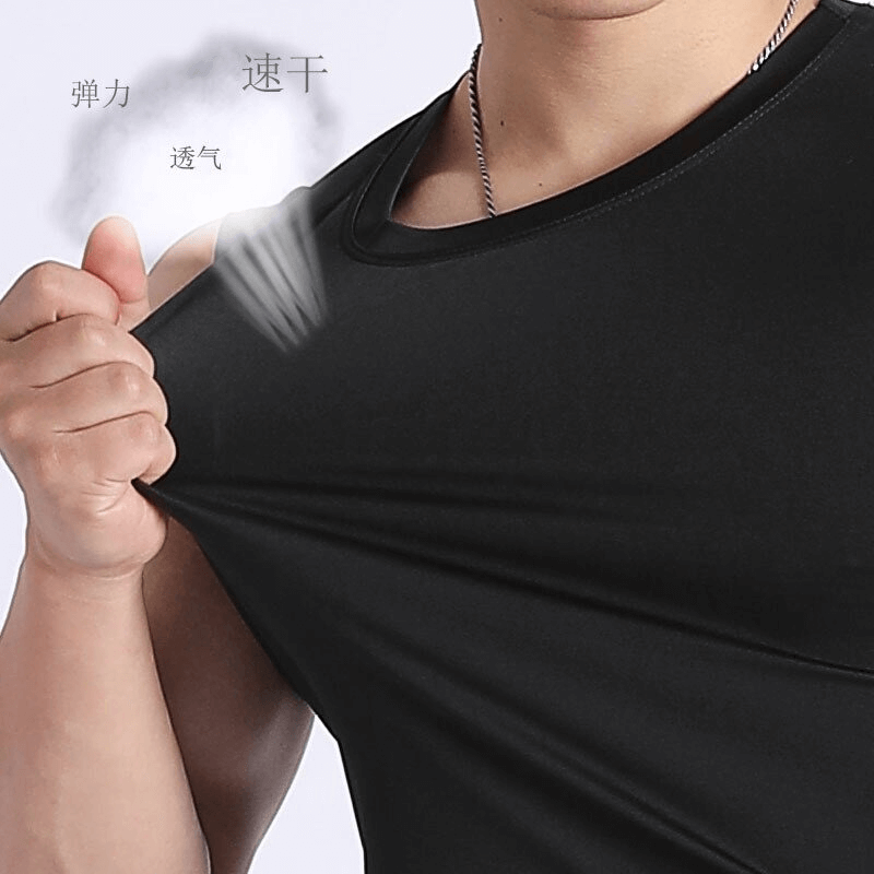 Man wearing black lightweight men's compression tank top showcasing flexibility and breathability
