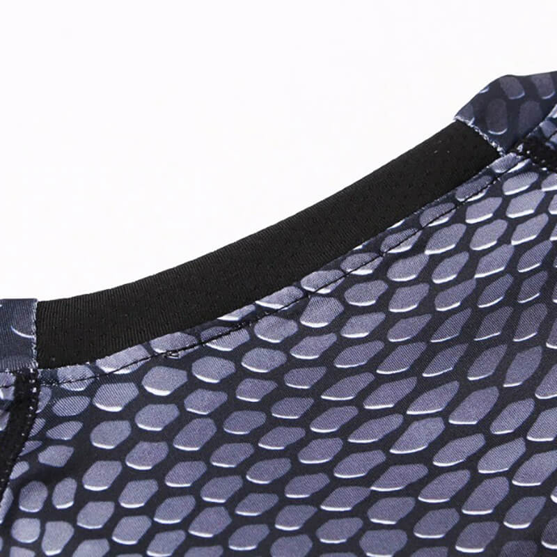 Close-up of men's compression top with snake skin 3D print, O-neck design, and breathable polyester fabric for running and high-performance activities.