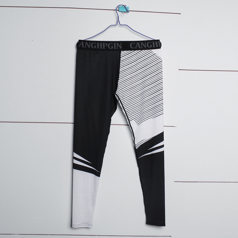 Men's compression sports leggings in black and white, perfect for running and training, made from Polyester, Spandex, and Bamboo Fiber.
