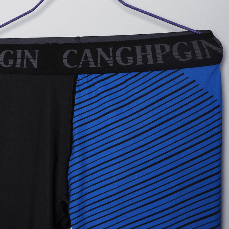 Blue and black men's compression sports leggings with striped design, perfect for running and training, hanging on a hanger.