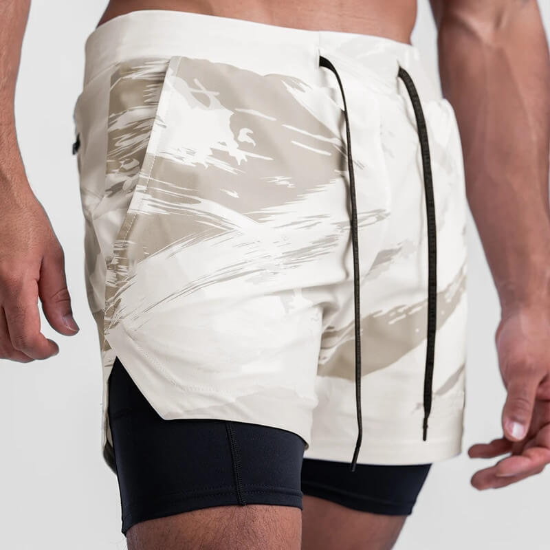 Men's double-layer sports running shorts with pockets, featuring a stylish white and black design, ideal for active and comfortable wear.