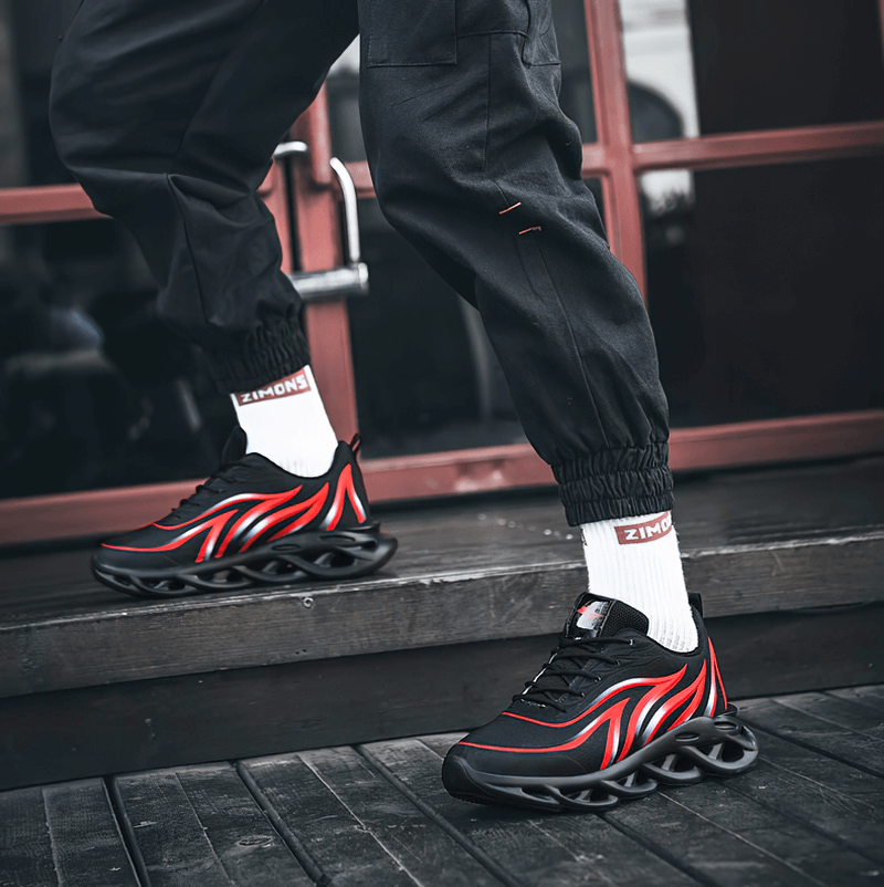 Men's flame printed lace-up sneakers with red and black design, perfect for outdoor sports, providing comfort and durability.