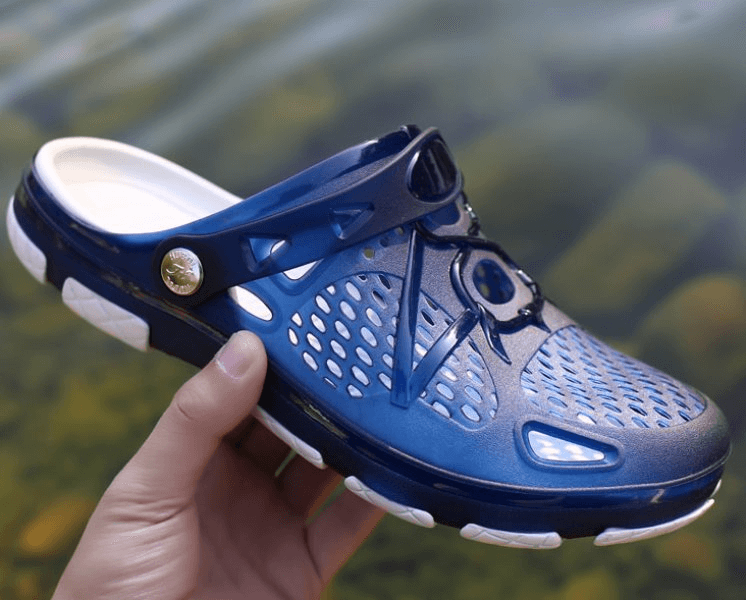 Men's blue lightweight breathable open heel flip flop with locking strap, featuring a mesh design and rubber sole.