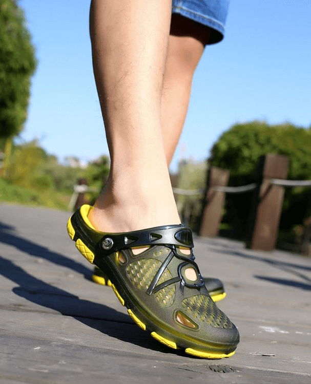Men's lightweight breathable open heel flip flops with locking strap, perfect for all-day comfort and beach adventures.