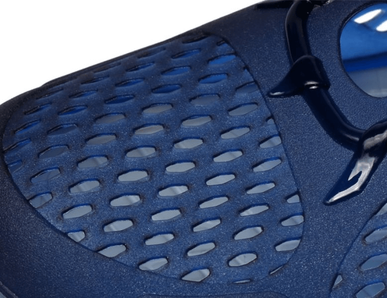 Close-up of navy breathable open heel beach flip flops with locking strap, showcasing ventilated design for all-day comfort.
