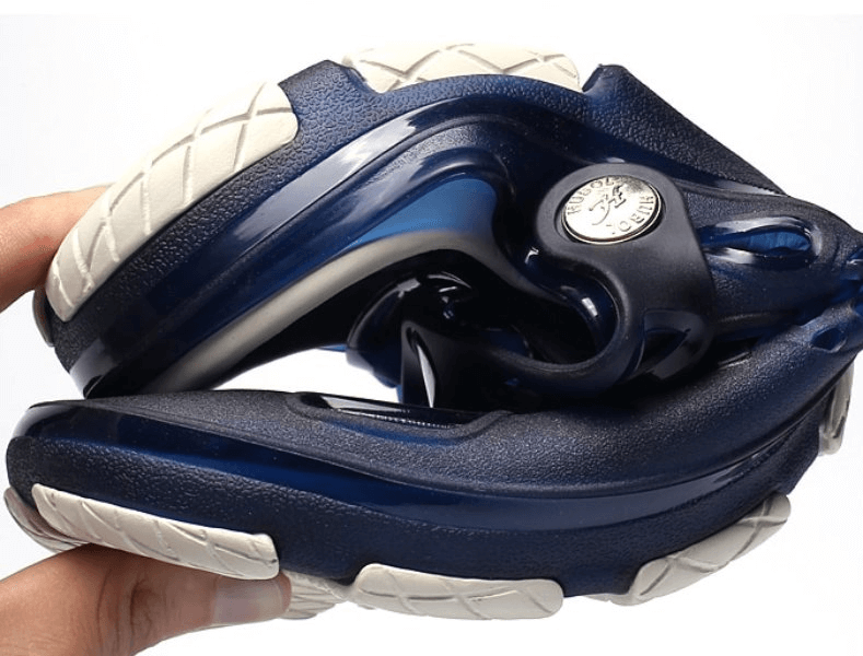 Flexible Men's blue beach flip flops with white rubber outsole and locking strap, showcasing lightweight and breathable design.