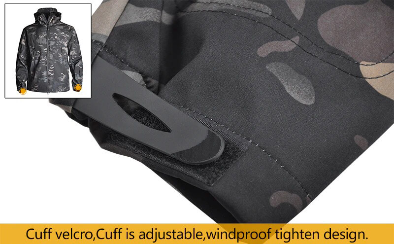 Close-up of adjustable cuff velcro on a men's military tactical jacket, highlighting windproof design, ideal for camping and hiking.