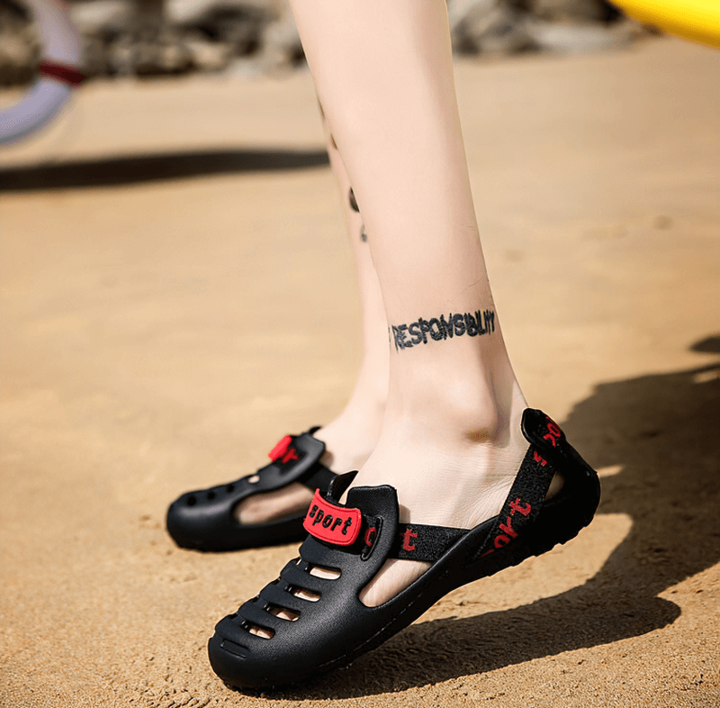 Men's black outdoor beach shoes with red accents, lightweight and flexible clogs perfect for beachwear.