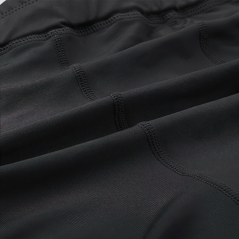 Close-up of men's outdoor running shorts showcasing elastic compression design for flexibility and comfort.