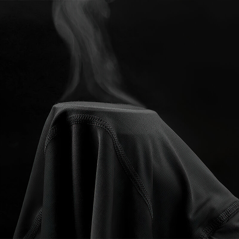 Close-up of black men's running shorts showcasing breathable fabric and stitching details against a dark background.