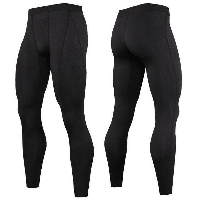 Men's black quick dry workout tights, full-length compression sports pants, made from polyester and spandex for flexibility and support.
