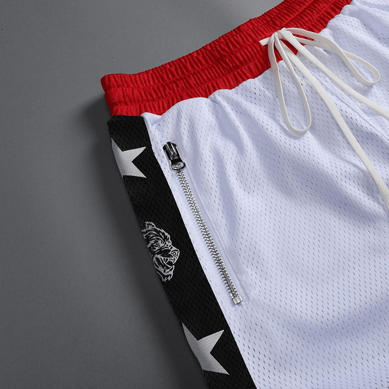 Men's quick-drying basketball shorts with red waistband and pockets, featuring star design and zipper detail.
