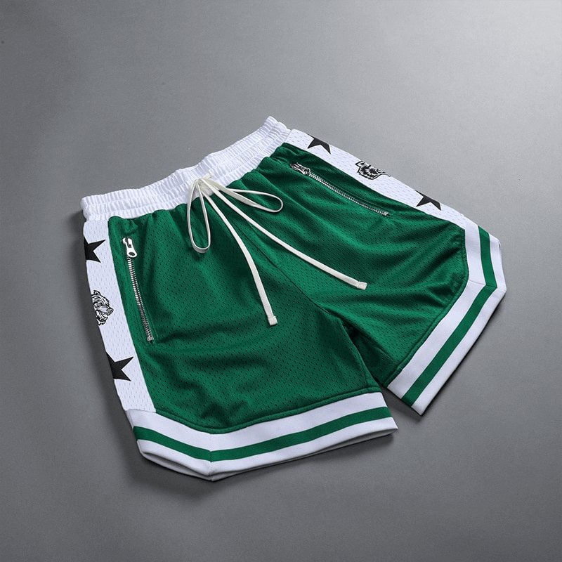 Men's green quick-drying basketball shorts with stars and white trim, featuring zippered pockets and drawstring waist.