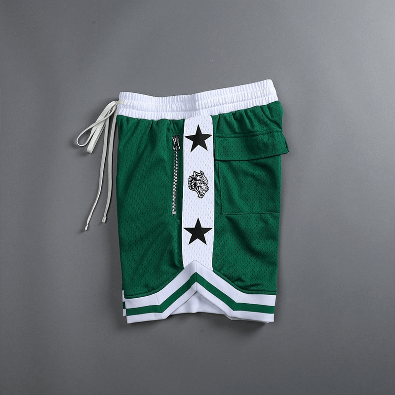 Green and white men's basketball shorts with stars, featuring a loose fit and pockets for comfort and style on the court.