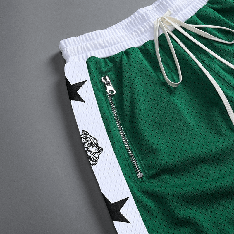 Green men's quick-drying basketball shorts with white waistband, pockets, and star pattern. Ideal for sports and running.