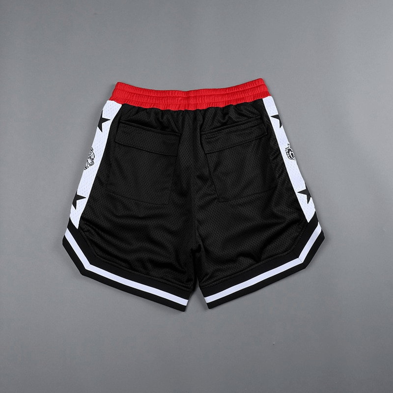 Men's quick-drying loose basketball shorts, black with red waist and star details, featuring two pockets. Perfect for running and sports.
