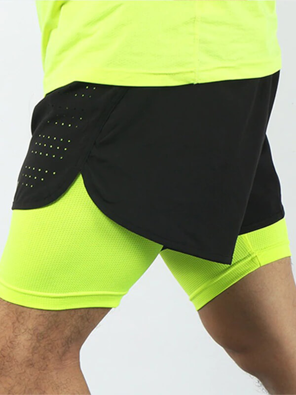 Men's running shorts with longer liner in neon yellow, showing flexible design and breathable fabric for ultimate comfort and performance.