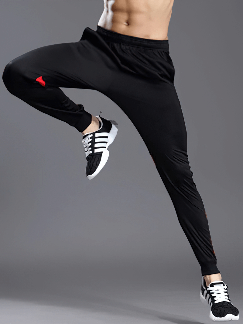 Men's running sports pants with zipper pockets, full-length design, crafted from durable polyester, ideal for high-performance running.