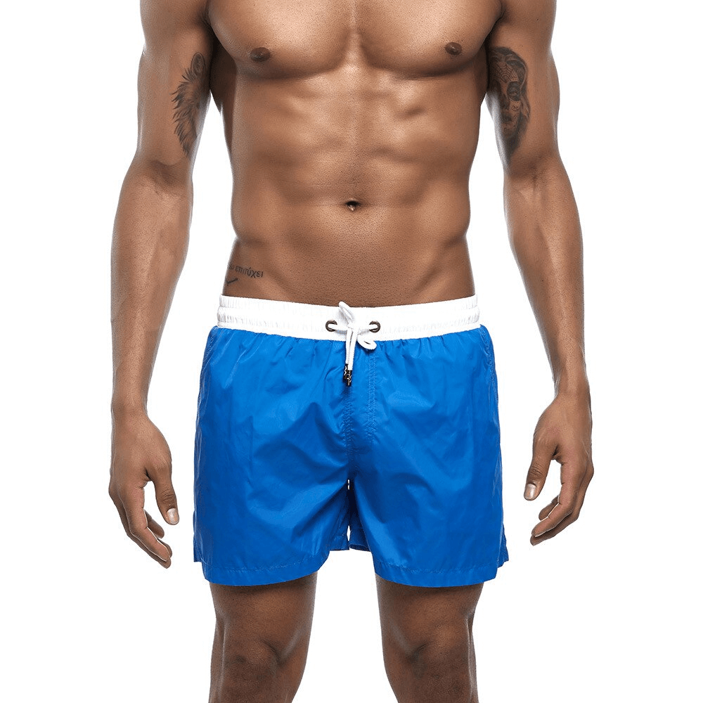 Men's blue quick dry swimming shorts with white drawstring, perfect for beach activities, made from durable polyester.