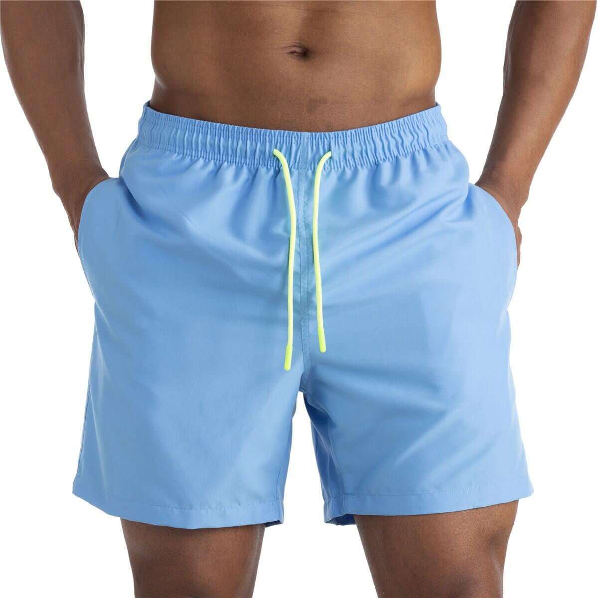 Men's solid color boardshorts with pockets, perfect for swimming, featuring quick-dry polyester and a comfortable fit.