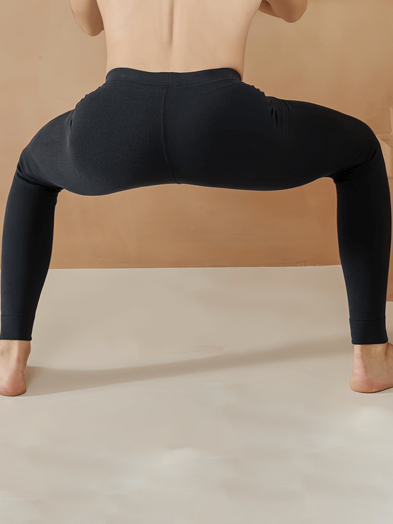 Back view of men's solid color thermal pants with elastic waistband showcasing full-length leg fit, SF1053.