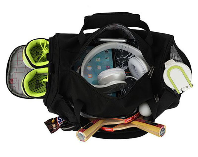 Black men's sports crossbody bag with separate shoes compartment, holding sneakers and fitness gear. Capacity: 20-35L, made with terylene.